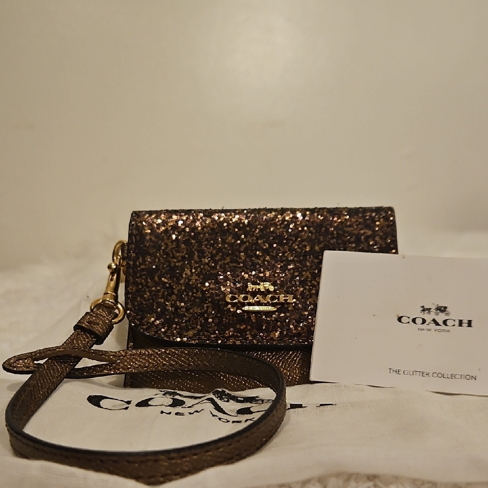 NWOT Coach Glitter Collection Wristlet With Dustbag.